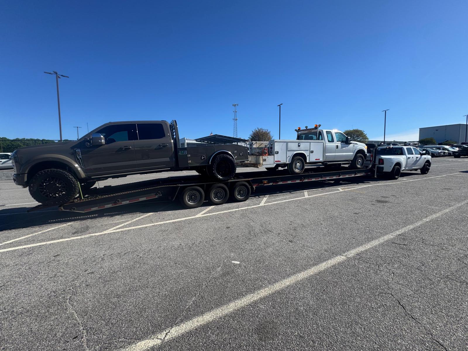 OPS Transportation open trailer vehicle hauling